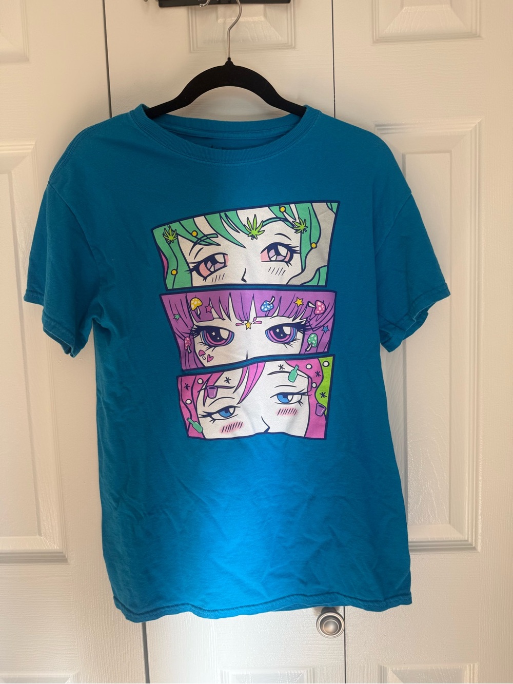 Spencer's Teal Kids Tee with Colorful Anime Eyes Panels
